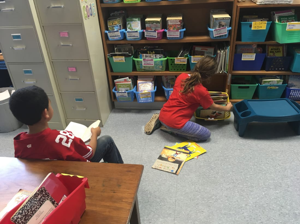 Figure 4. 2nd graders maintaining the classroom library during the school year